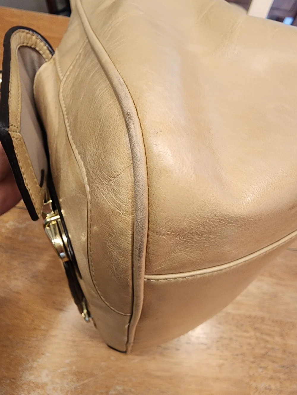 2011 Coach Poppy Push Lock Satchel features a beige leather exterior